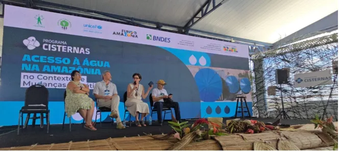 Lilian Rahal, Secretária Nacional de Segurança Alimentar e Nutricional fala ao lado de Júlio Barbosa, Presidente do Conselho Nacional de Populações Extrativistas e de Caetano Scannavino, Coordenador do Projeto Saúde e Alegria
